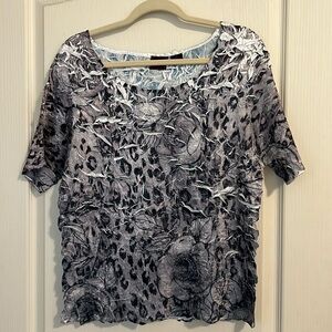 Woman’s size XL short sleeve top. Never worn